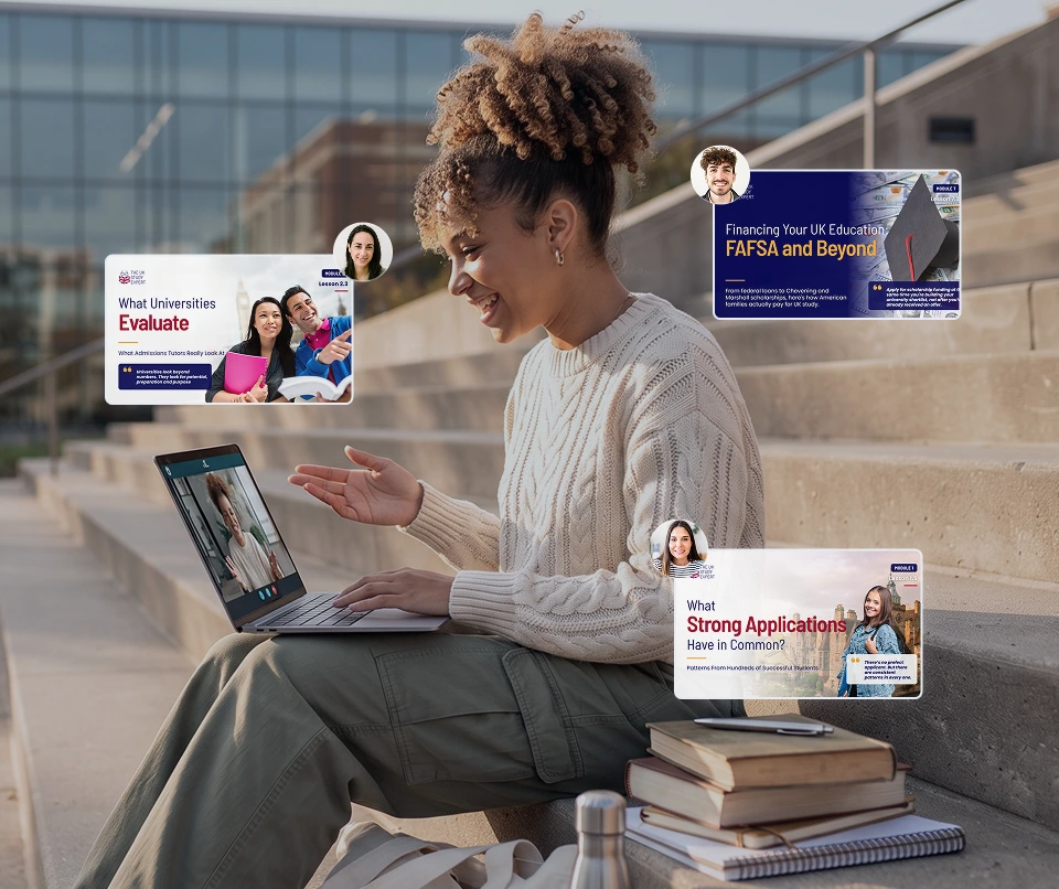 A woman seated on outdoor steps, focused on her laptop, with a casual and relaxed demeanor.